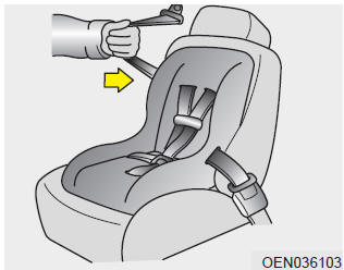 4.Slowly allow the shoulder portion of the seat belt to retract and listen for